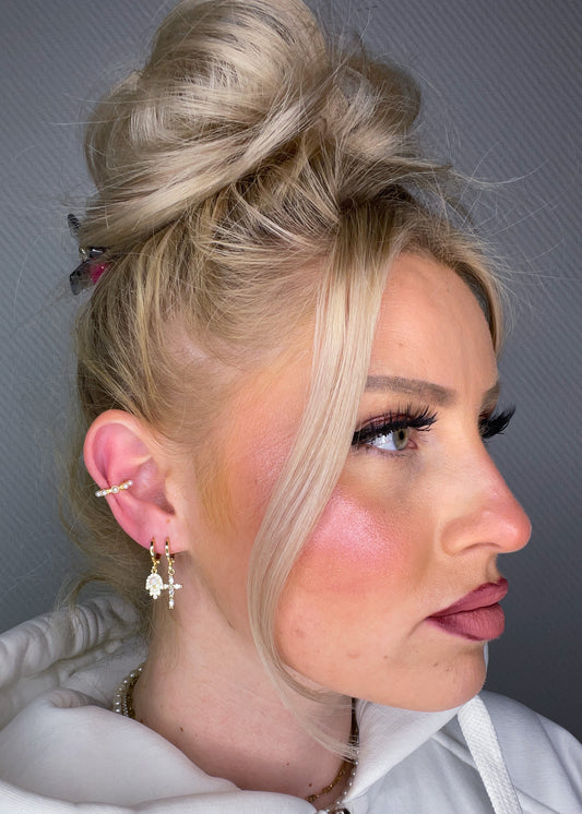 Ohrring Beschützer Hand